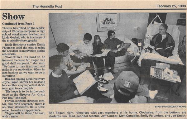 Clipping of a 1998 newspaper article showing Bob in his hospital bed surrounded by students